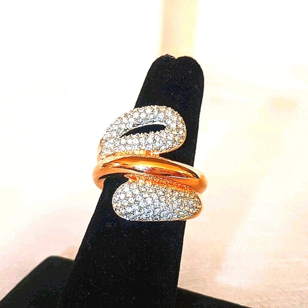 Swarovski rose gold wrap-around ring. Size 6